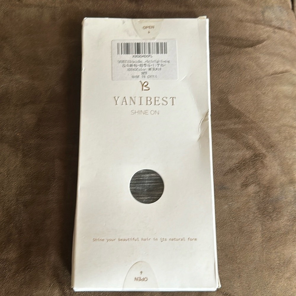 New in box hair cover